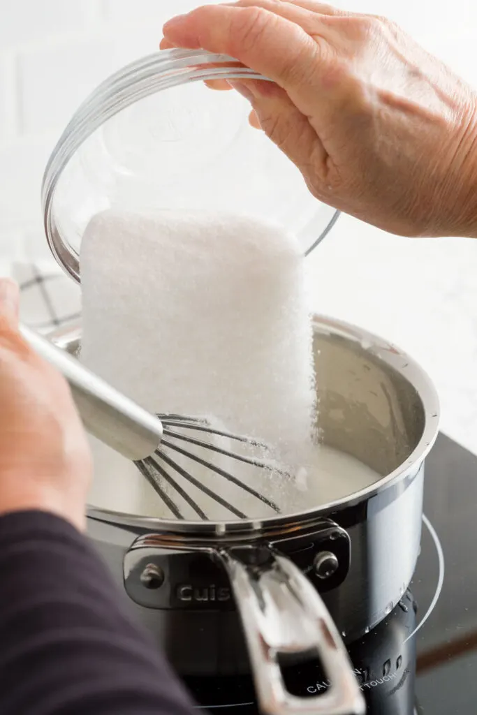 Adding sugar to the mixture