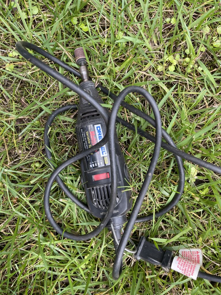 Dremel tool in the grass