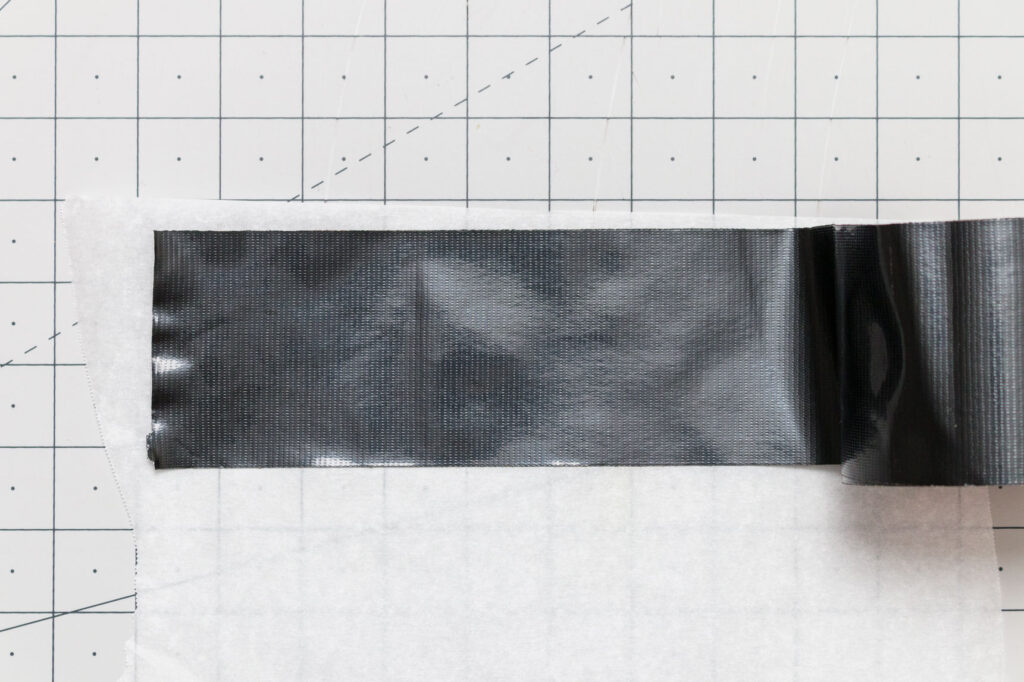 Electrical tape placed on parchment paper