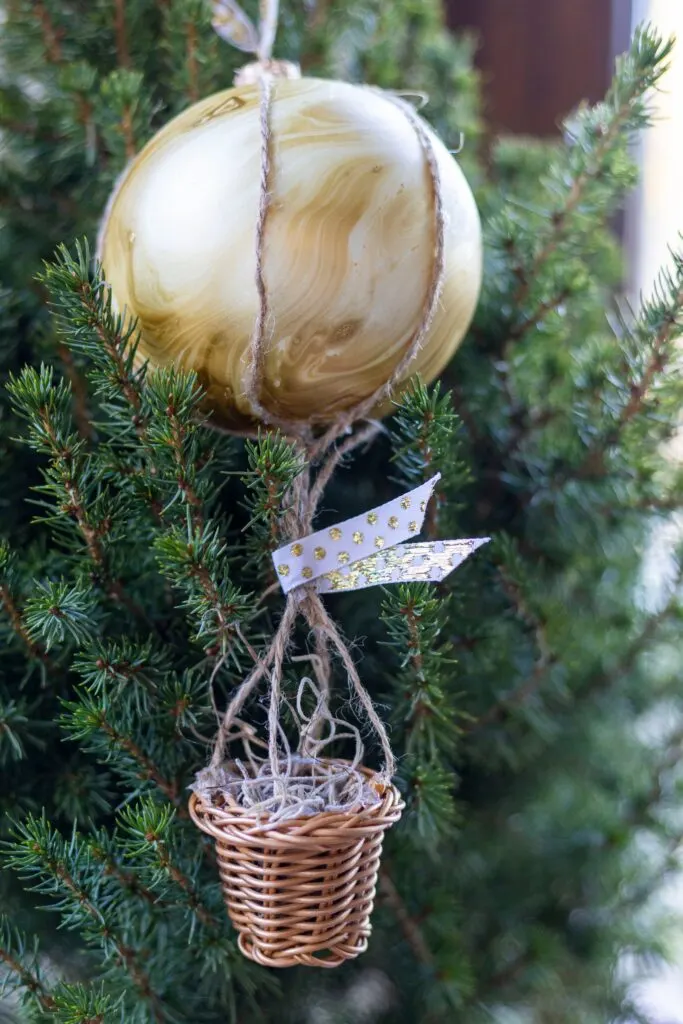 Air Balloon Ornament hanging in a tree 