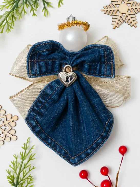Blue jean pocket angel ornament on a table