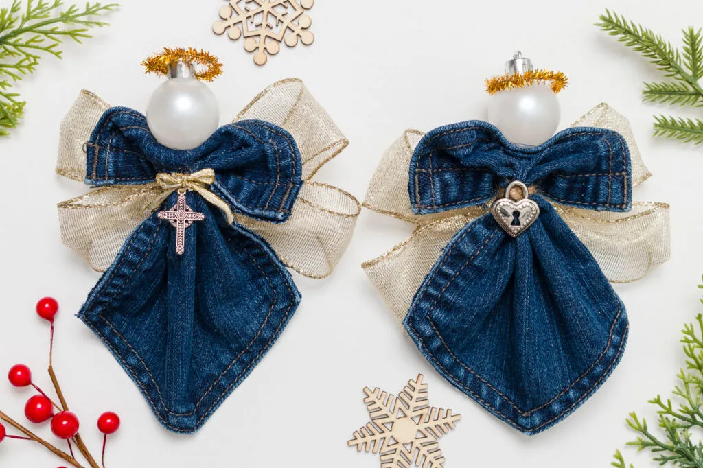 Two denim pocket angels on a white table