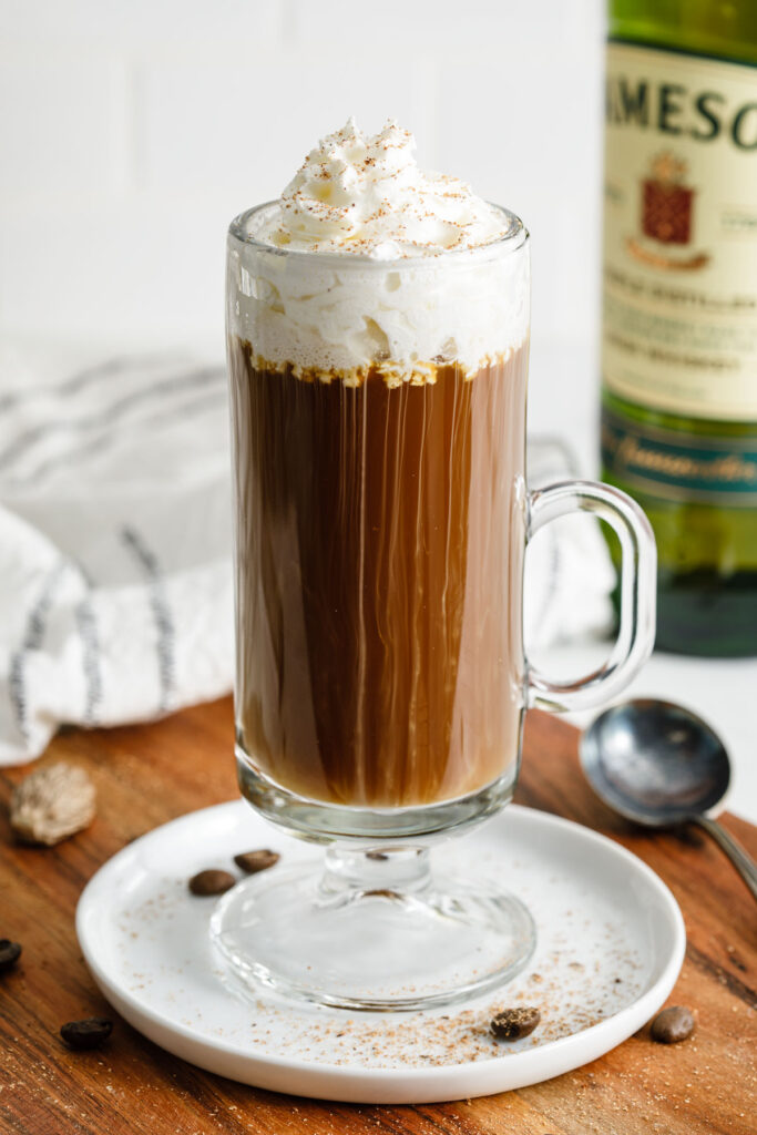 A cup of Irish Coffee garnished with nutmeg