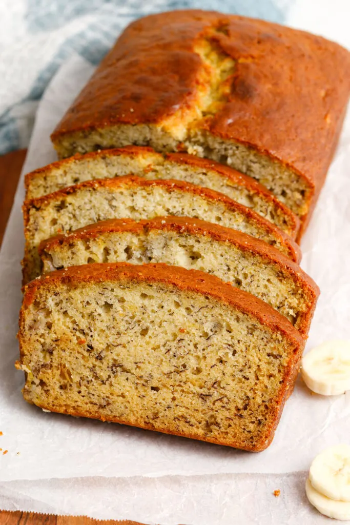 Banana bread sliced on a cutting board