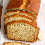 Sliced banana bread on a cutting board