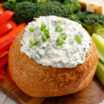 knorr spinach dip in a bread bowl with veggies