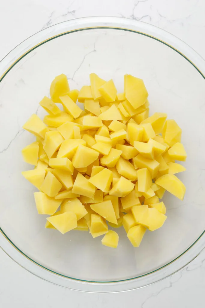 Cooked diced potatoes in a bowl