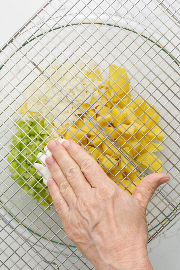 Diced eggs with a cooling rack