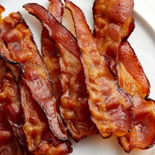 oven cooked bacon on a plate