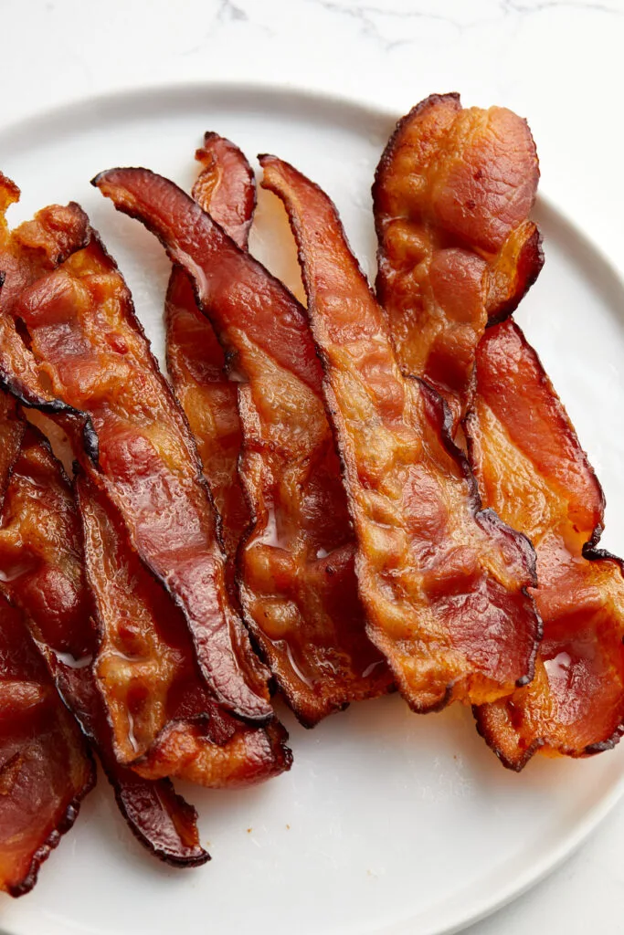 plate with crispy oven cooked bacon