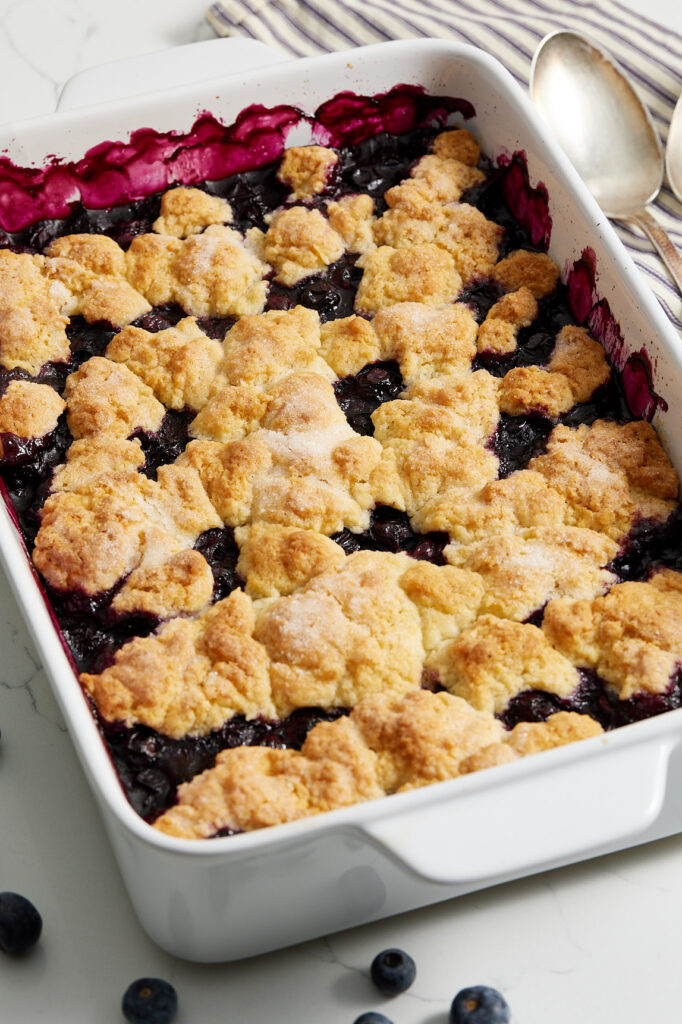 Baked blueberry cobbler in a casserole dish
