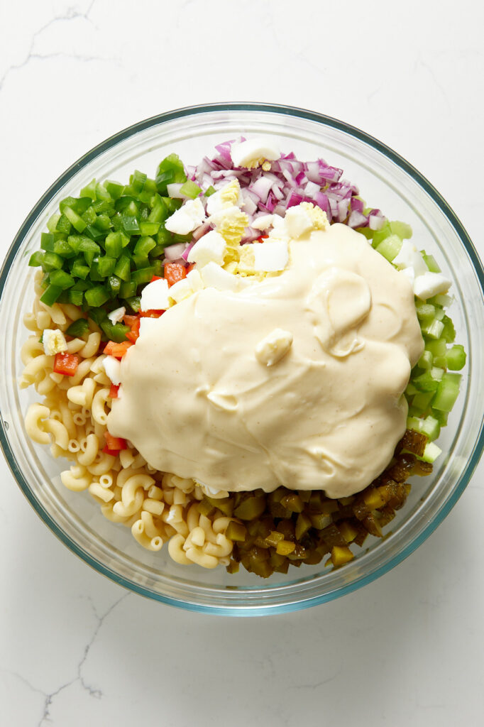 Salad dressing poured over the veggies