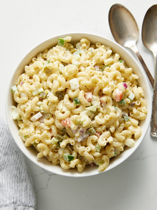 Macaroni salad with spoons