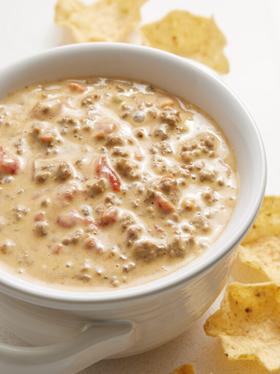Rotel dip with chips on a table