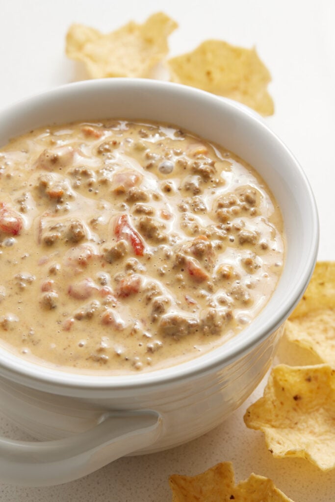 Rotel dip with chips on a table